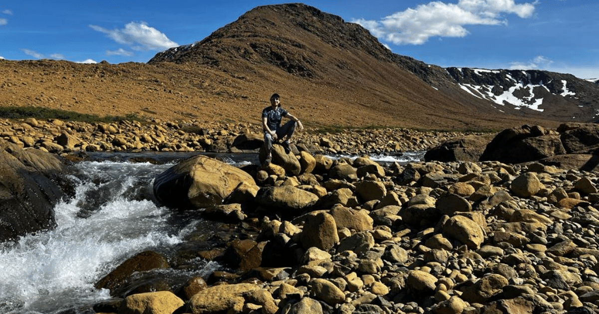 Arbo, World Traveler, Resting by Waterfalls After Tablelands Hike & Walking on Earth’s Mantle in Newfoundland